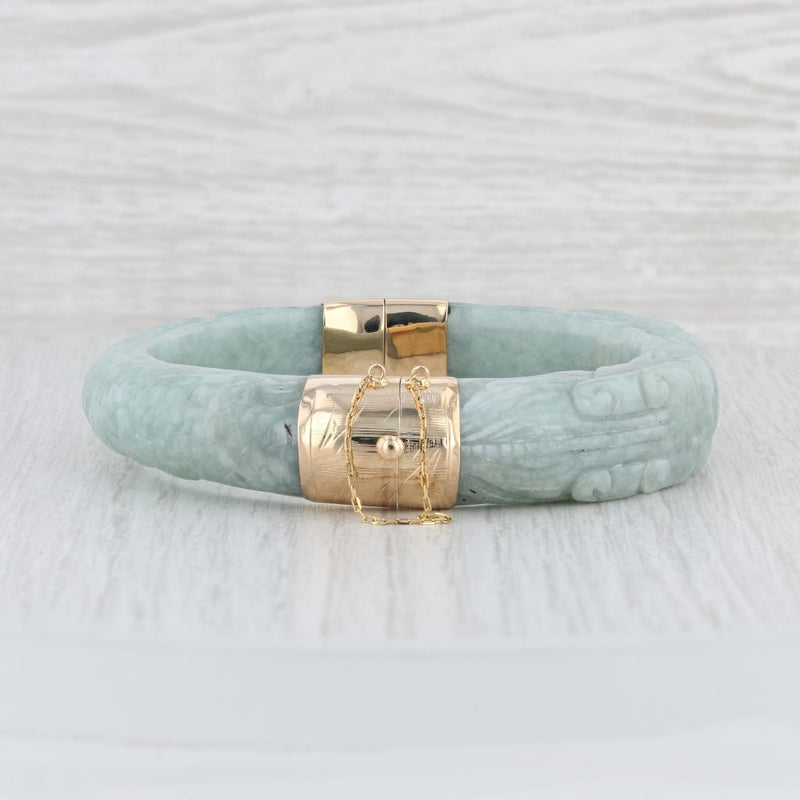 A pair of Chinese hand carved green Nephrite Jade bangle… | Drouot.com